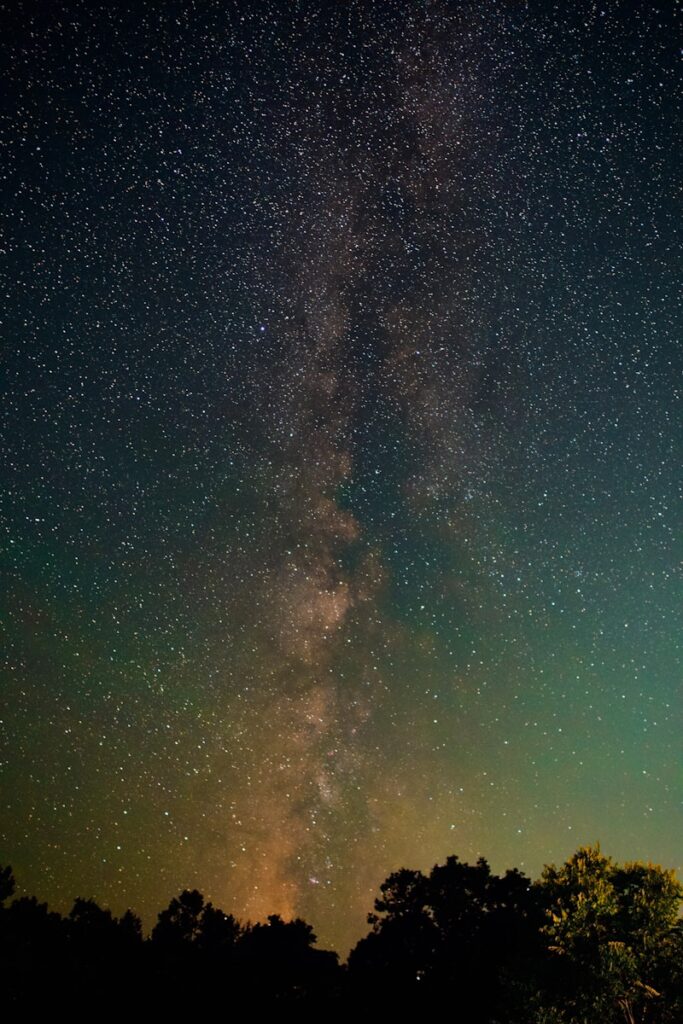 blue sky with stars during night time